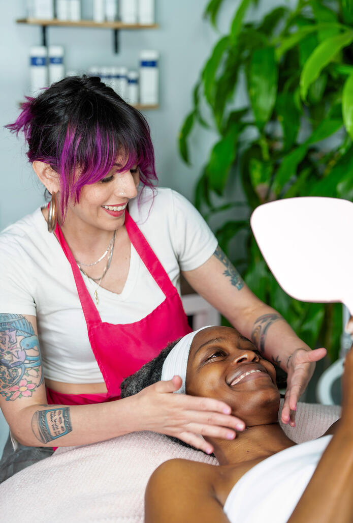 Allison applying a facial